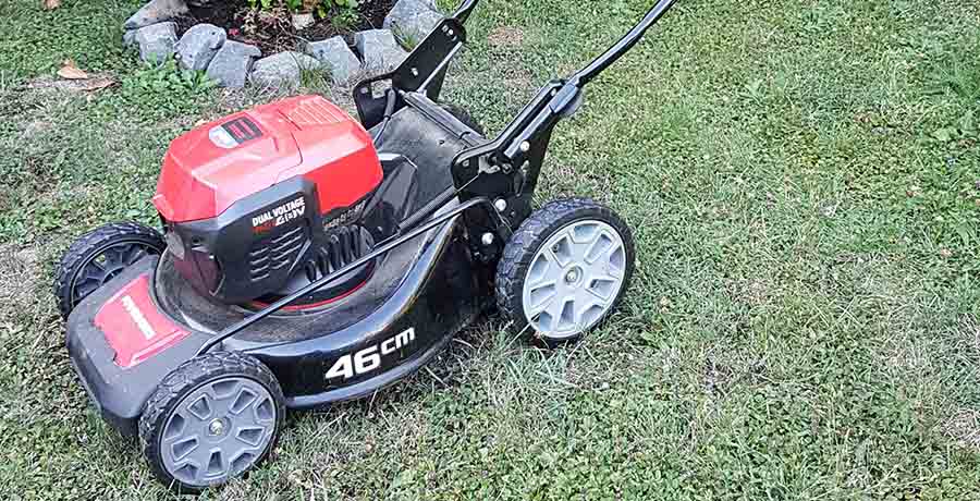 how to raise the wheels on a lawn mower