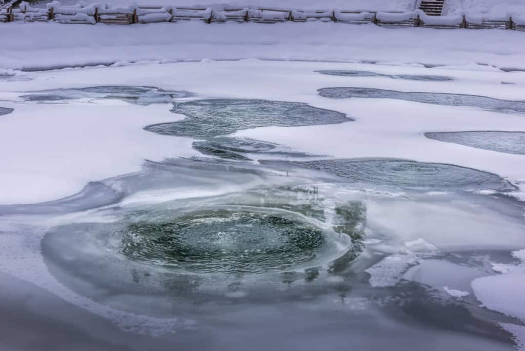 what-to-do-if-your-fish-pond-freezes-over-landscapingplanet